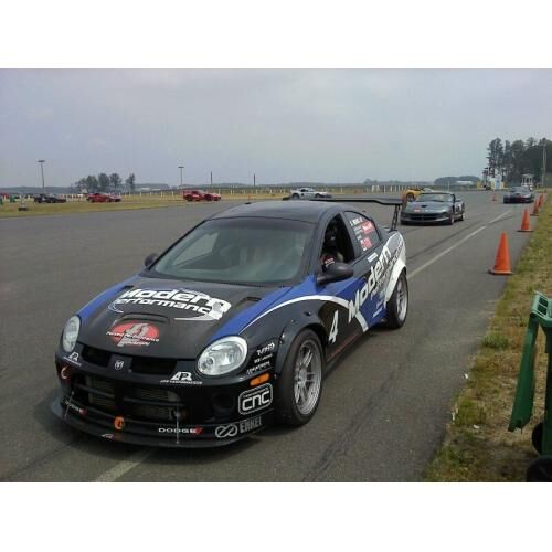 2003-2005 Dodge SRT4 APR Carbon Fiber Front Splitter With Rods