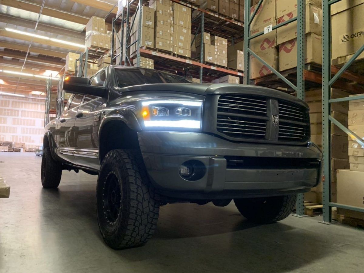 06-08 Dodge Ram 2500/3500 LUXX-Series LED Projector Headlights Alpha-Black by AlphaRex