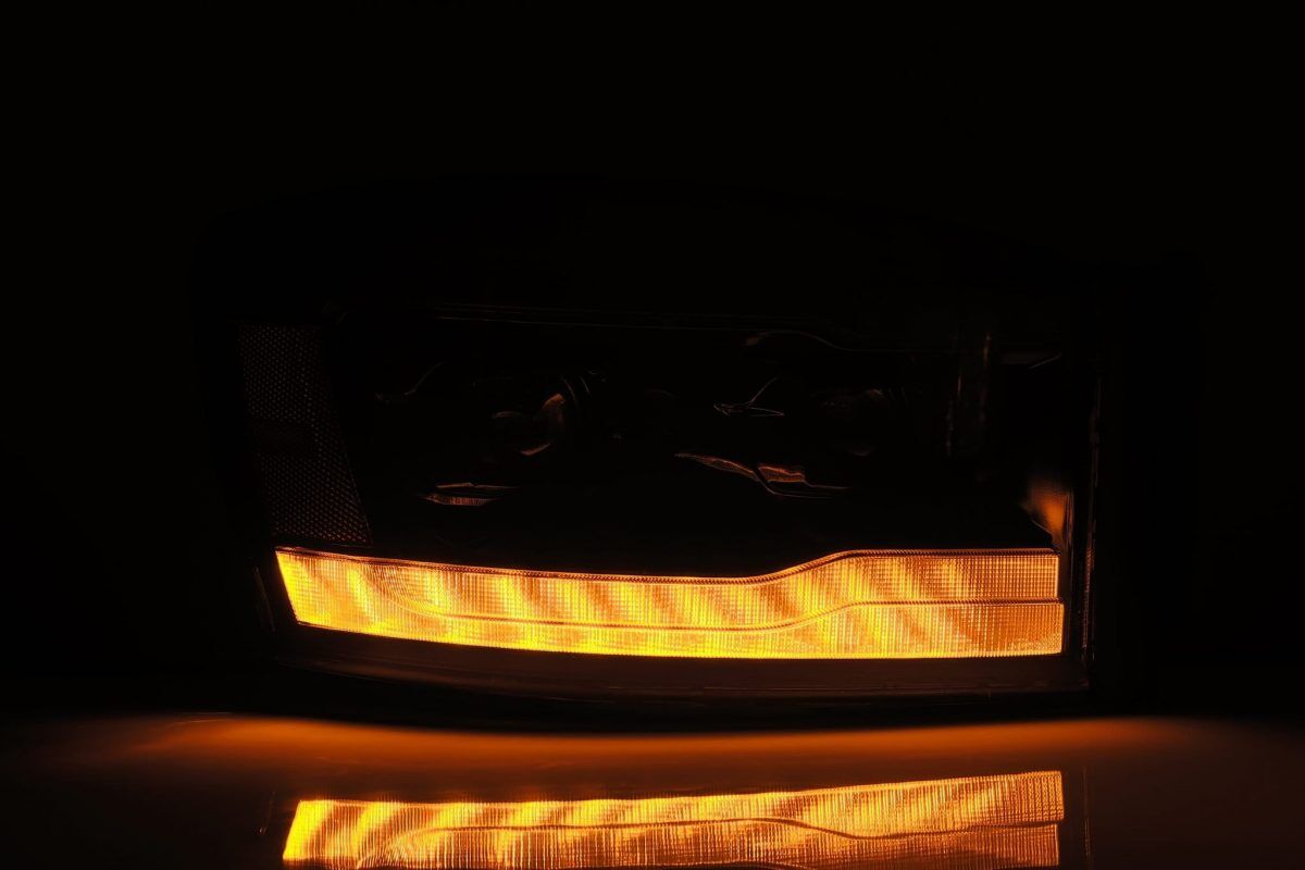 06-08 Dodge Ram 2500/3500 LUXX-Series LED Projector Headlights Alpha-Black by AlphaRex