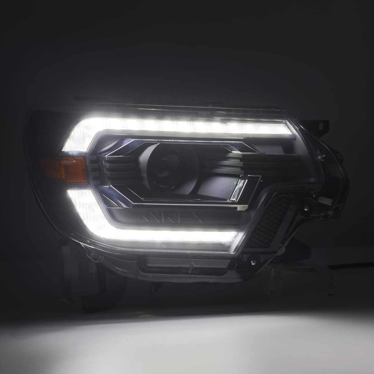 12-15 Toyota Tacoma LUXX-Series LED Projector Headlights Black by AlphaRex