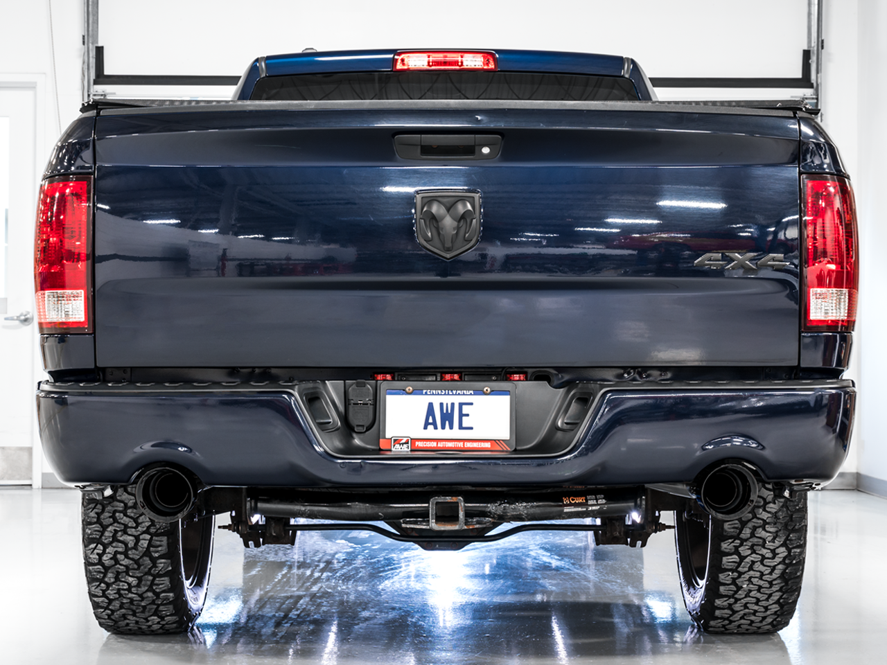 AWE Tuning 0FG Dual Rear Exit Catback Exhaust for 4th Gen RAM 1500 5.7L (with bumper cutouts) - Diamond Black Tips