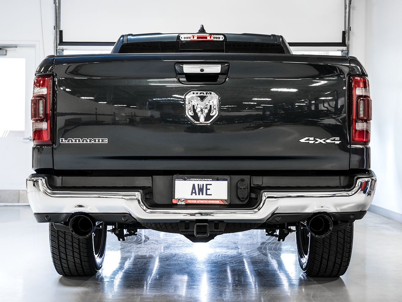 AWE Tuning 0FG Dual Rear Exit Catback Exhaust for 5th Gen RAM 1500 5.7L (with bumper cutouts) - Diamond Black Tips