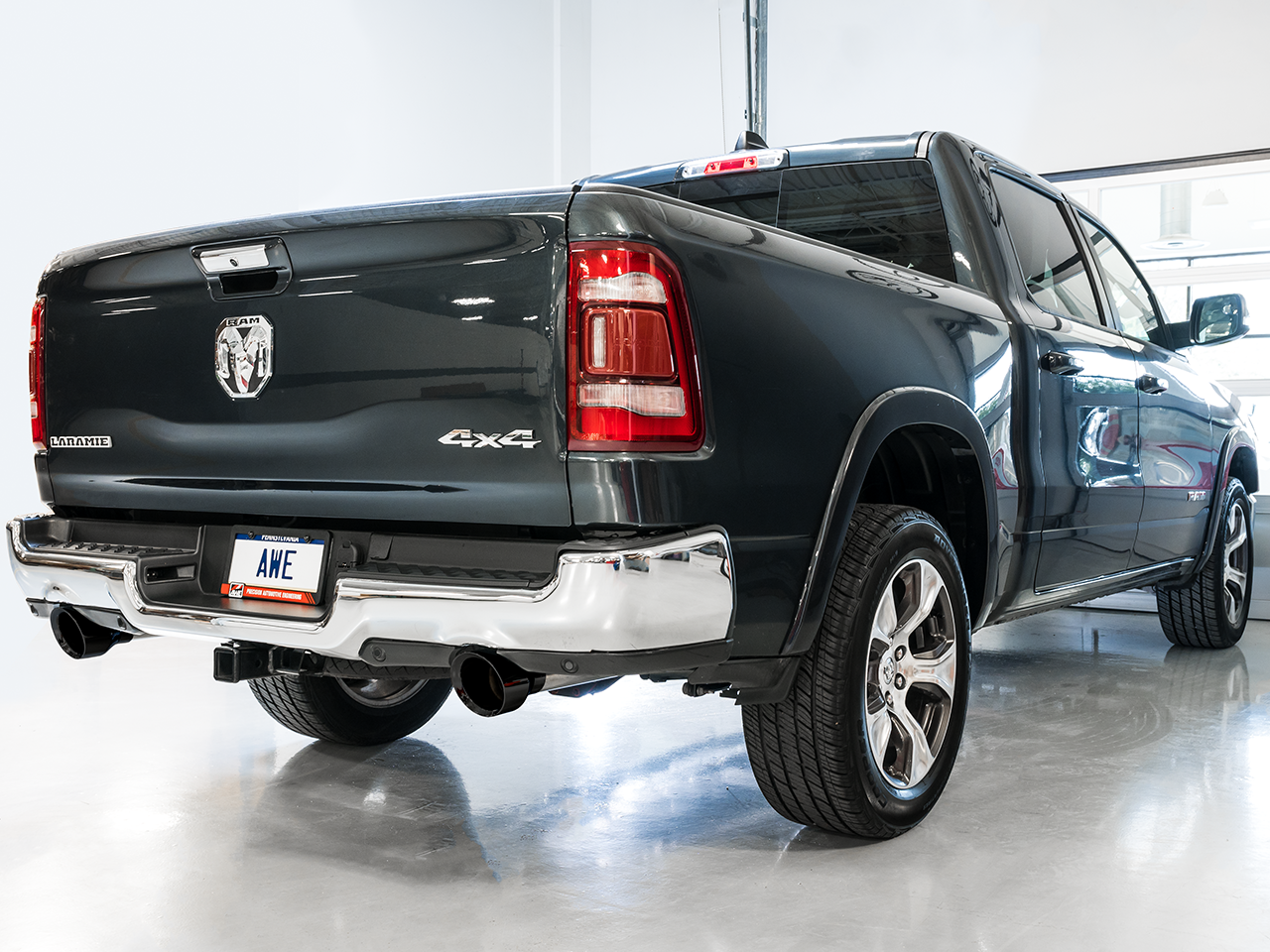 AWE Tuning 0FG Dual Rear Exit Catback Exhaust for 5th Gen RAM 1500 5.7L (with bumper cutouts) - Diamond Black Tips
