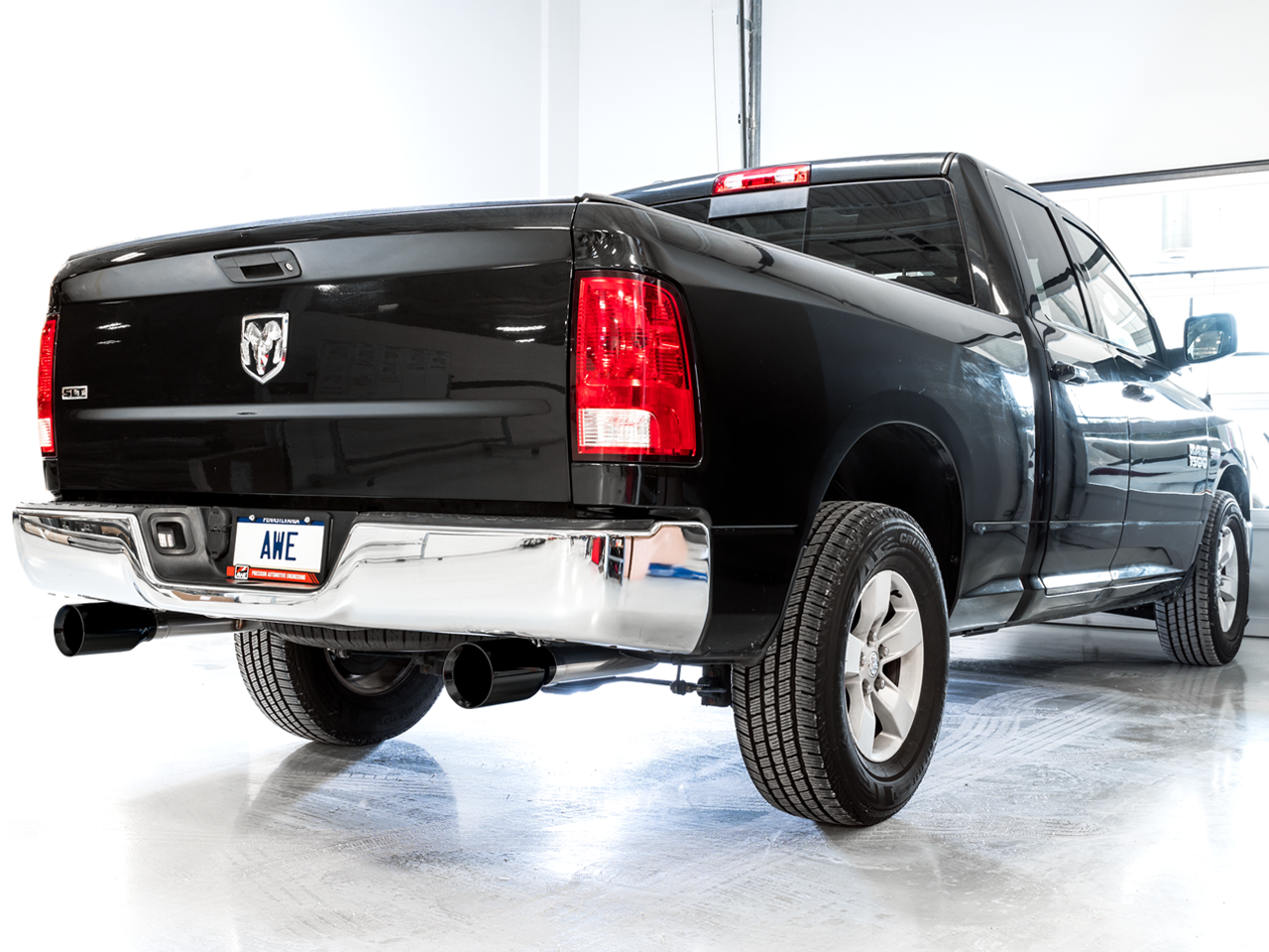AWE 0FG Dual Rear Exit Catback Exhaust for 4th Gen RAM 1500 5.7L (without bumper cutouts) - Diamond Black Tips - 3015-33104