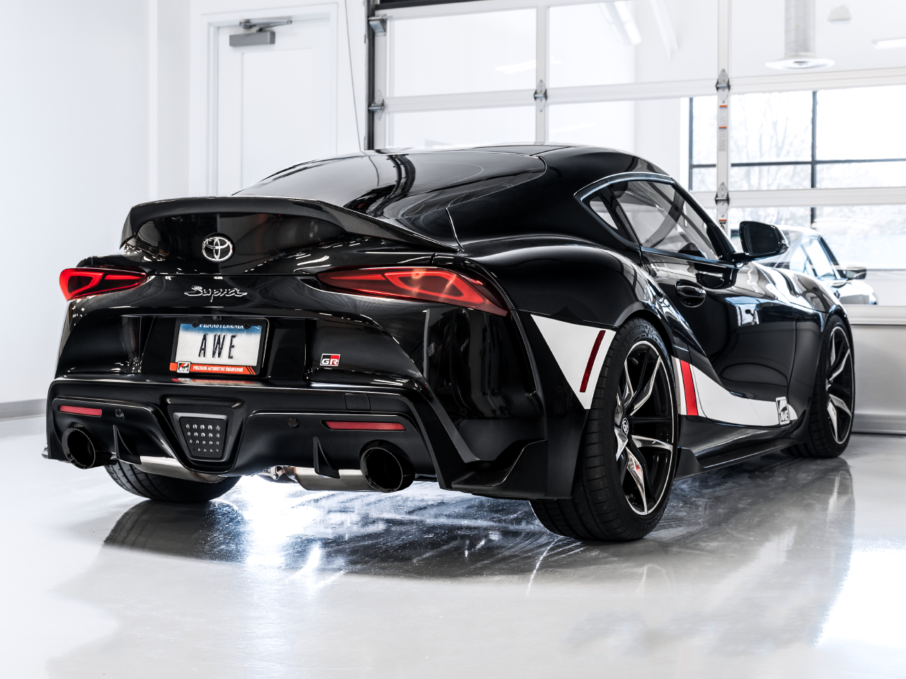 AWE Resonated Touring Edition Exhaust for A90 Supra - 5" Diamond Black Tips - 3015-33132