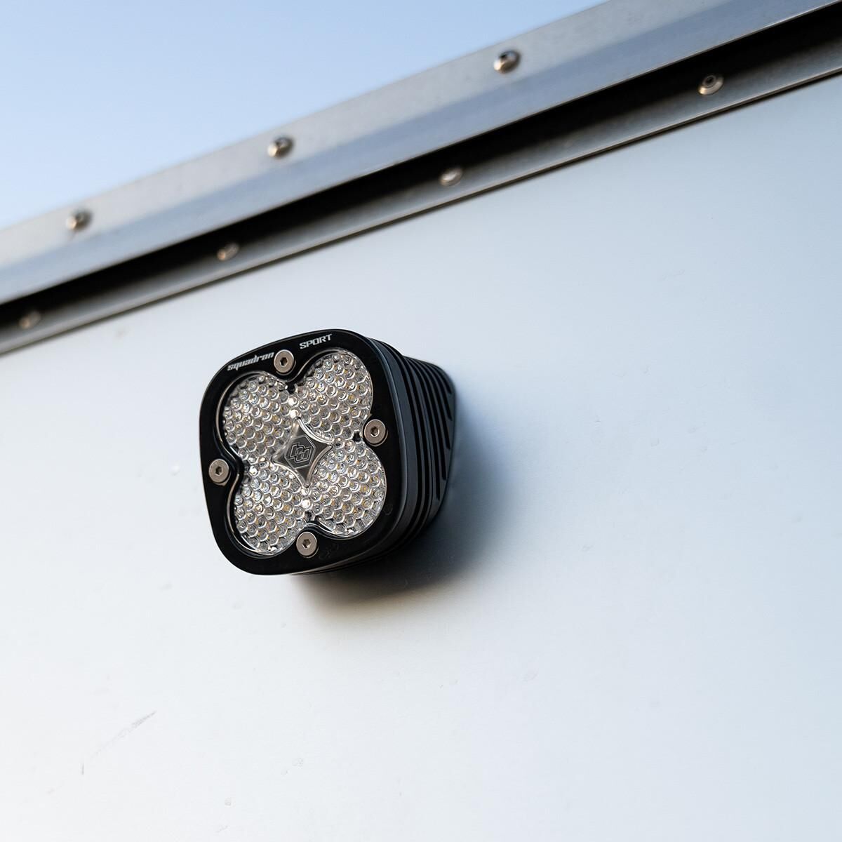 Flush Mount LED Light Pod Angled Black Clear Lens Work/Scene Pattern Squadron Sport by Baja Designs