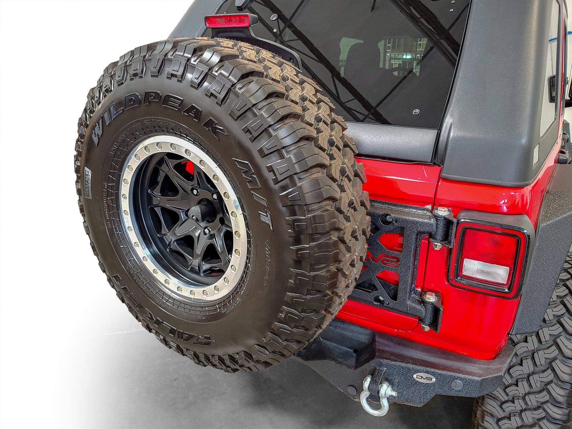 2018-2022 Jeep Wrangler JL Hinge Mounted Tire Carrier by DV8 Off-Road