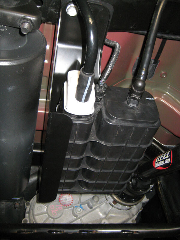 2007-2011 Jeep Wrangler MBRP Exhaust 131011 Heat Shield; Charcoal Canister Repositioning Kit; Black Coated
