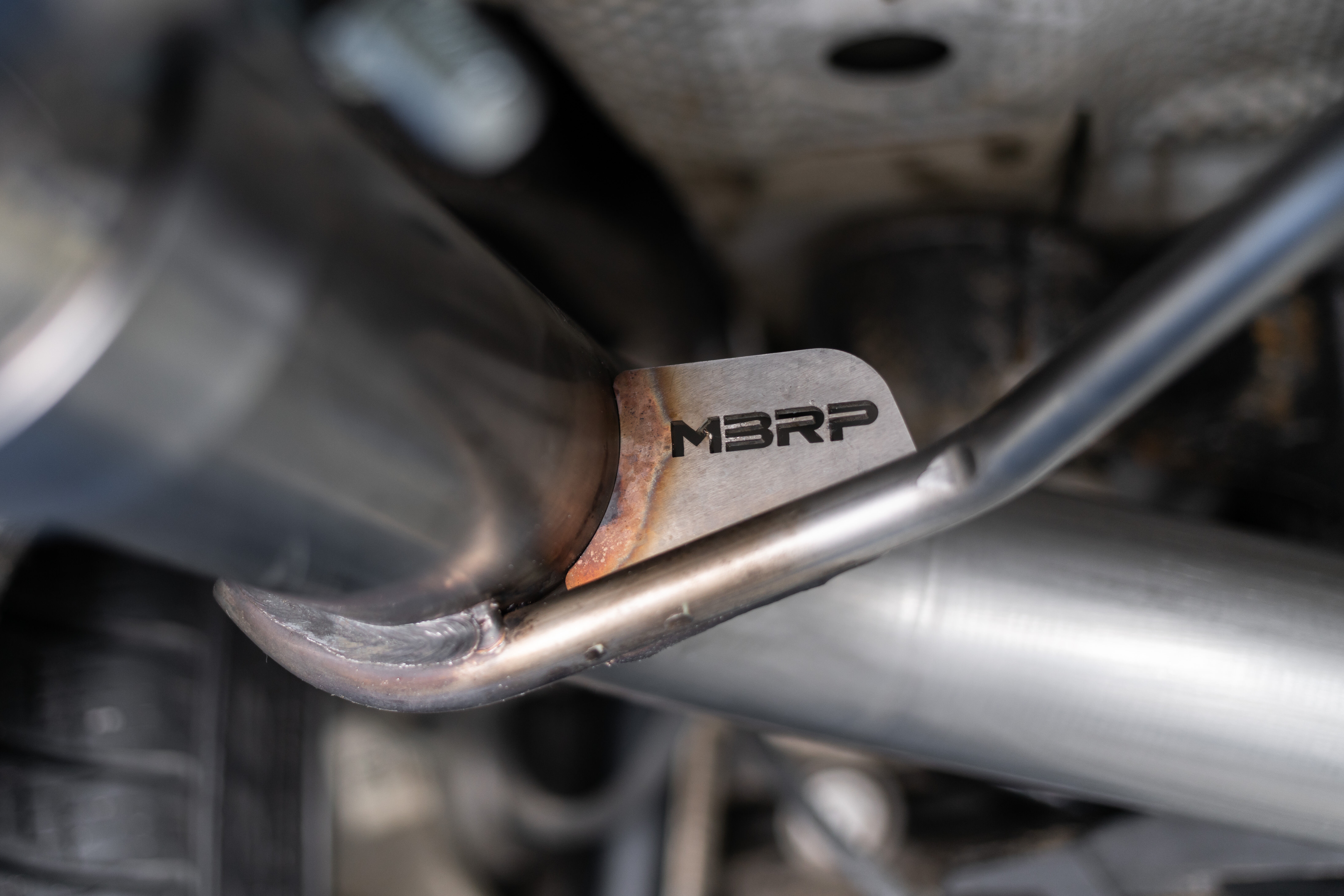 2017-2019 Porsche Macan S 3.0L V6 Sport Utility 4DR MBRP Exhaust 2.5" Axle Back, Dual Split Rea Muffler Bypass; T304, with Carbon Fiber Tips