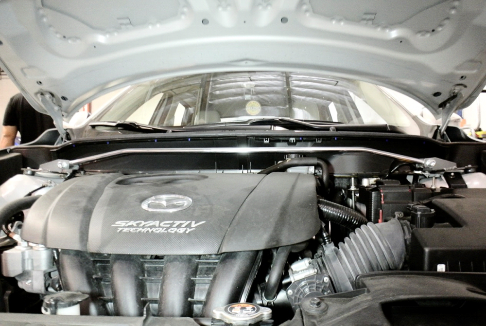 Mazda CX-3 16+ Front Upper Race-Spec Strut Tower Bars by Megan Racing