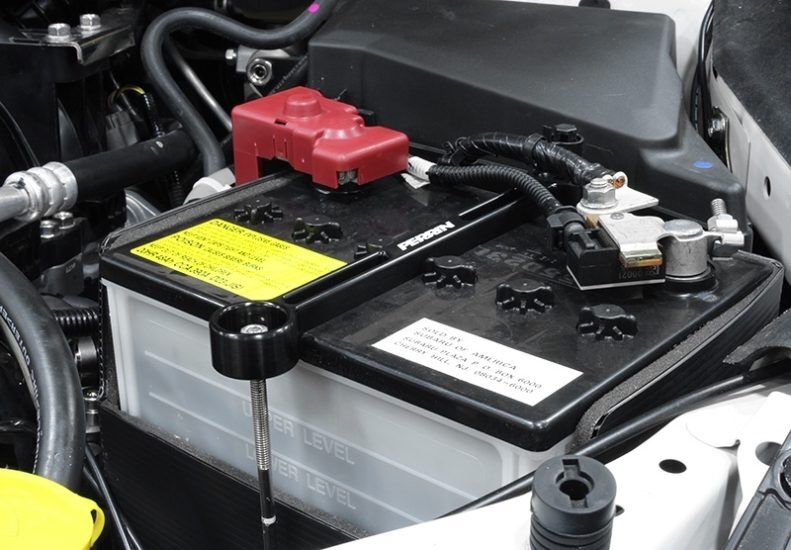 2005-2023 Subaru Outback Base/XT Black Battery Tie Down by Perrin