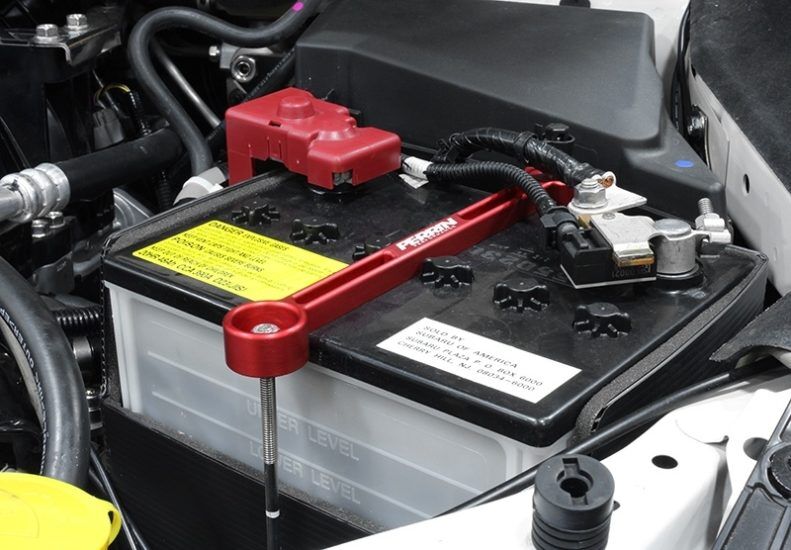 2005-2014 Subaru Legacy GT Red Battery Tie Down by Perrin
