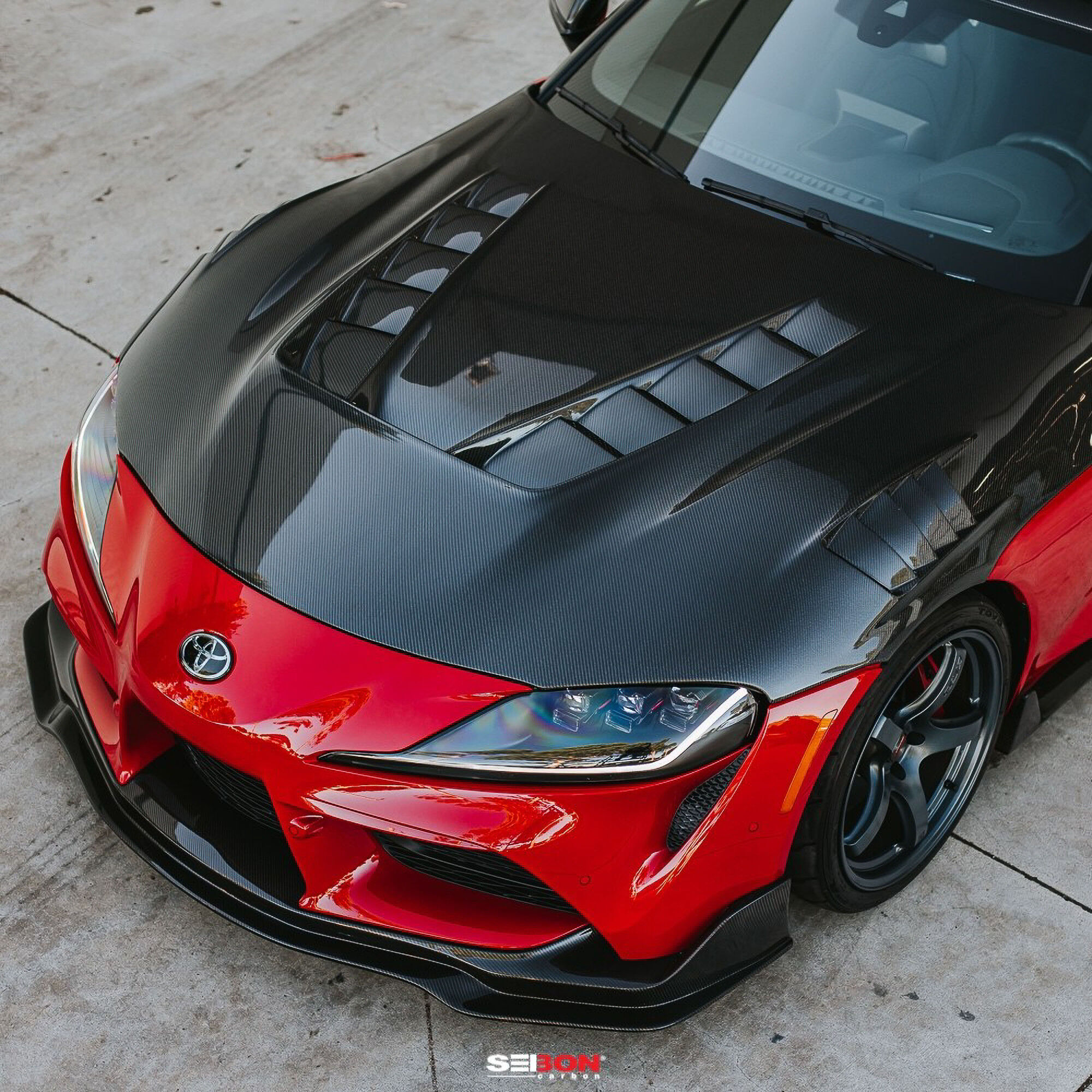 2020-2024 Toyota GR Supra TV Style double Sided Carbon Fiber Hood by Seibon