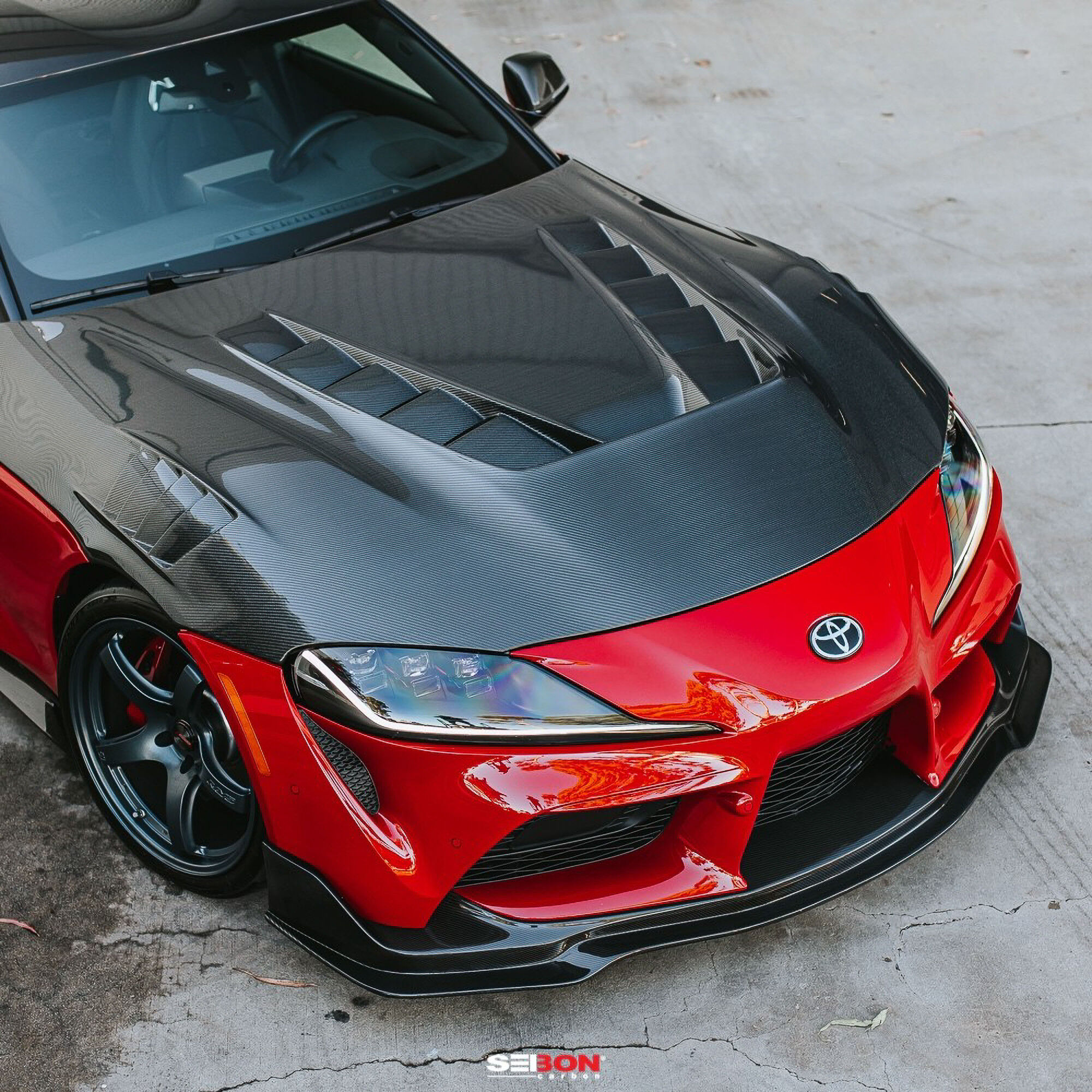 2020-2024 Toyota GR Supra TV Style double Sided Carbon Fiber Hood by Seibon